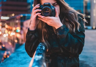 woman using camera