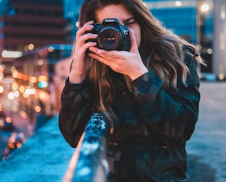 woman using camera