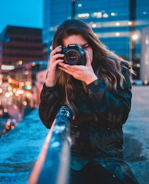 woman using camera