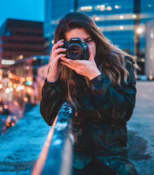 woman using camera