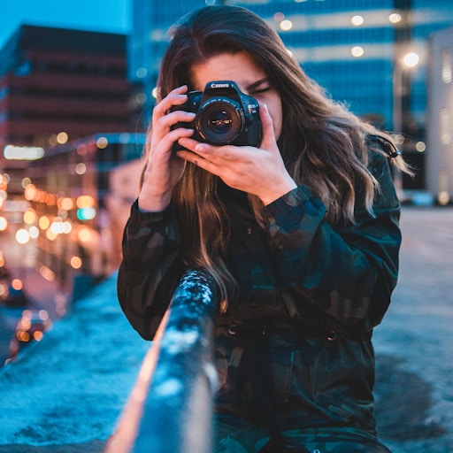 woman using camera