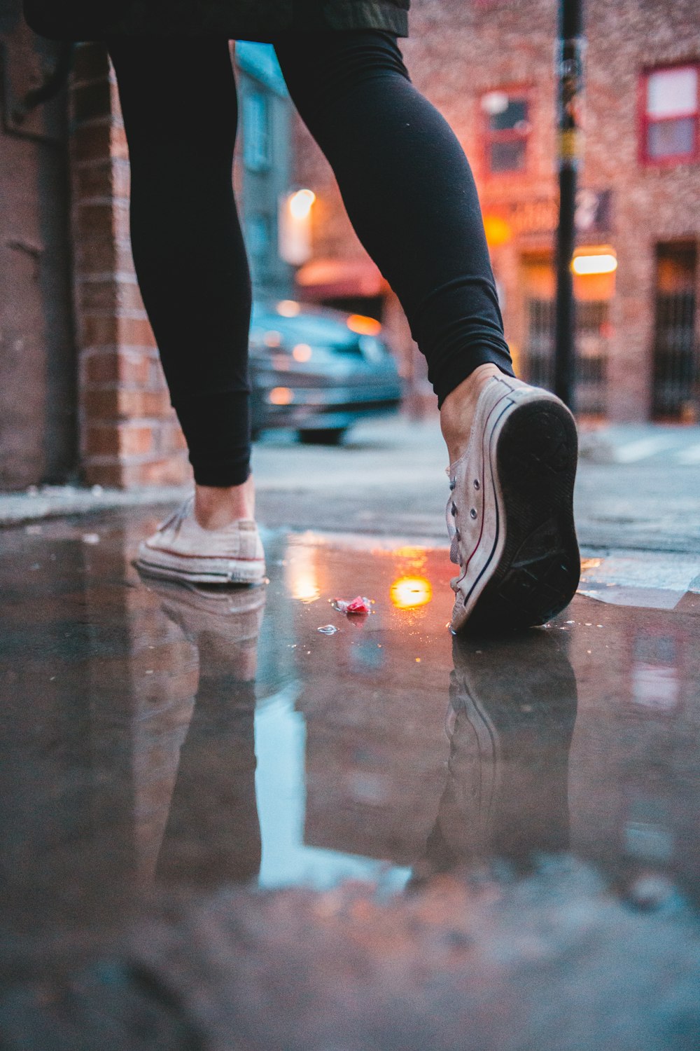 woman standing near building