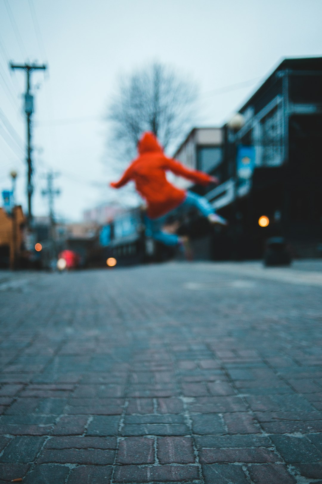 man in orange hoodie