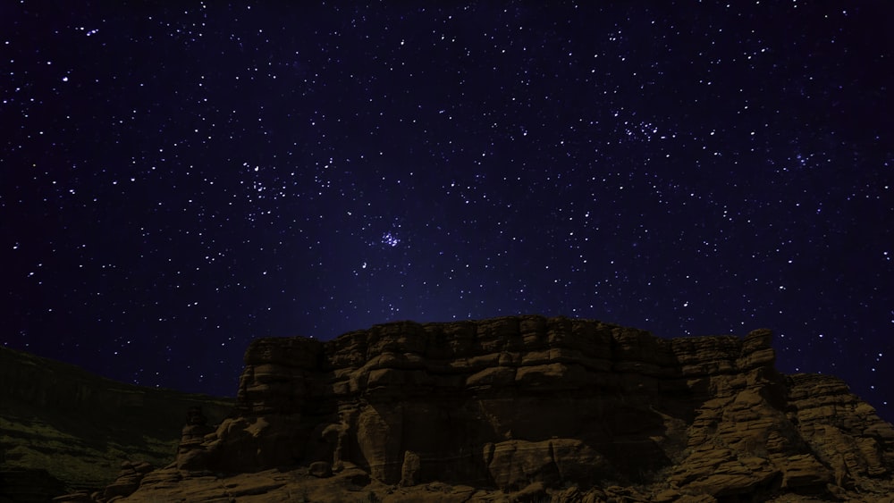 brown mountain during nighttime