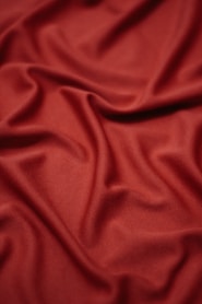 a close up view of a red fabric