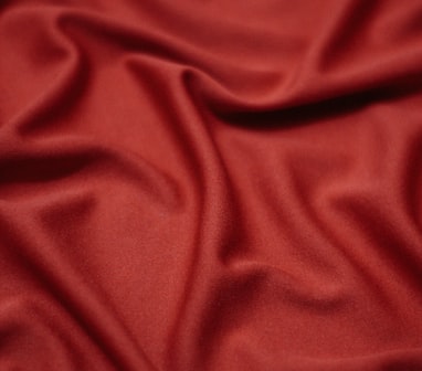 a close up view of a red fabric
