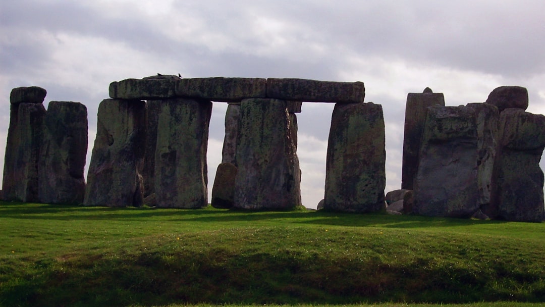 rock formation under white sky at daytime