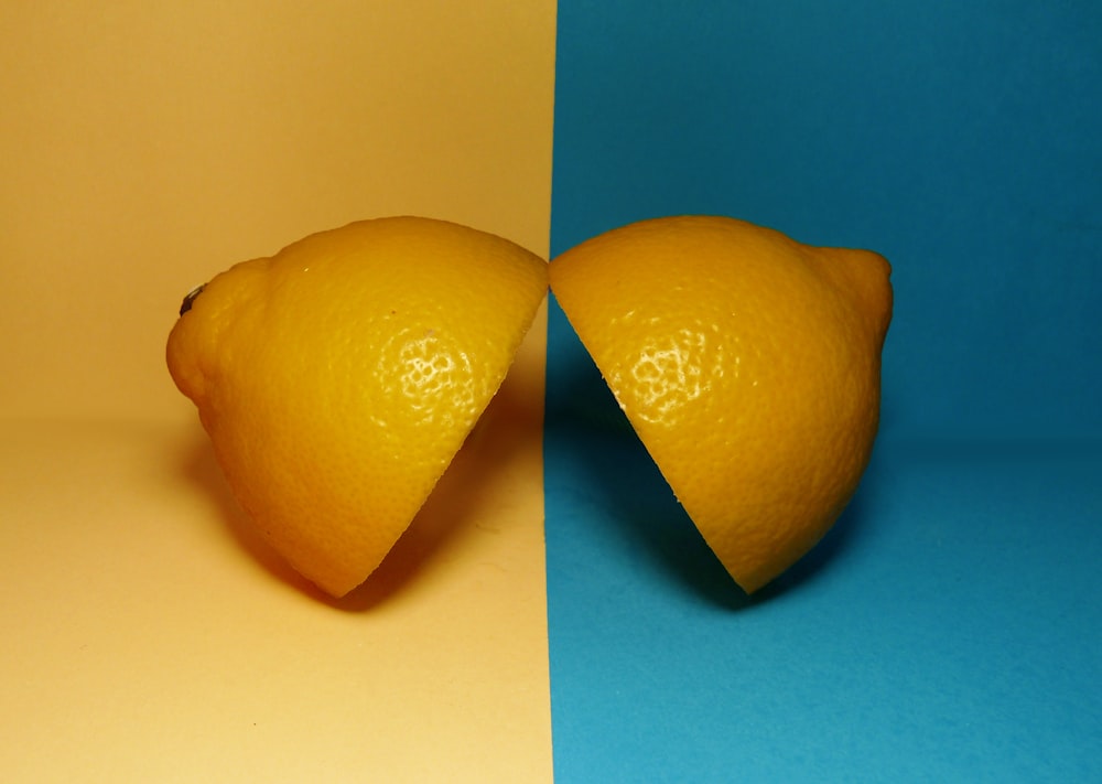 two sliced lemons on surface