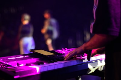 A musician using the Realbook Master app on stage.