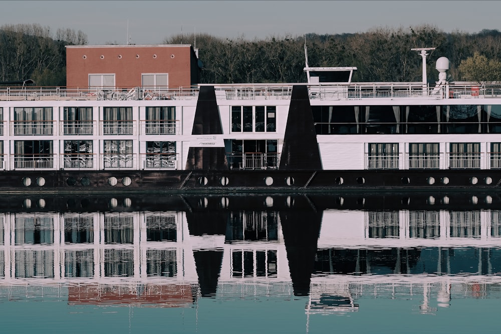 reflection photography of white building