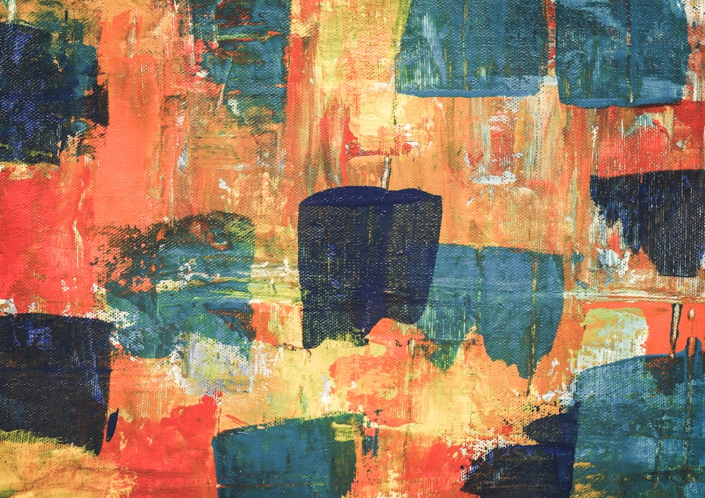orange, blue, and teal abstract painting