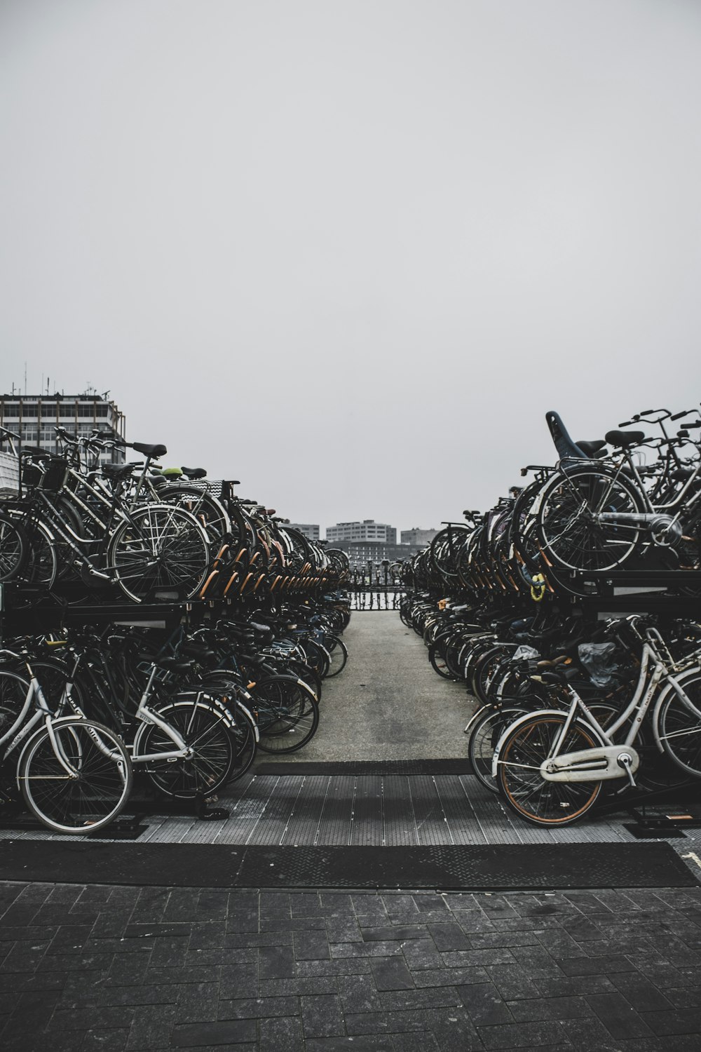 pile of bicycles outside during daytime