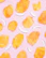 Bright, golden dehydrated pineapple slices arranged on a natural fiber cloth.