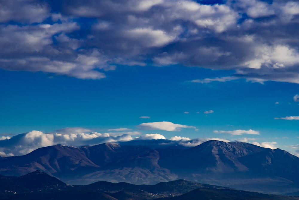 mountains under skies