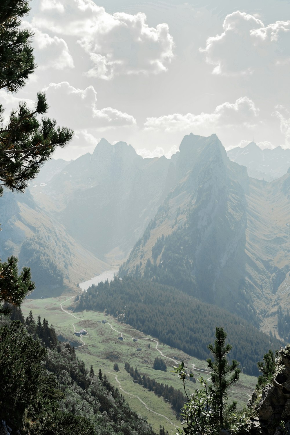 green mountain range under cloudy sky