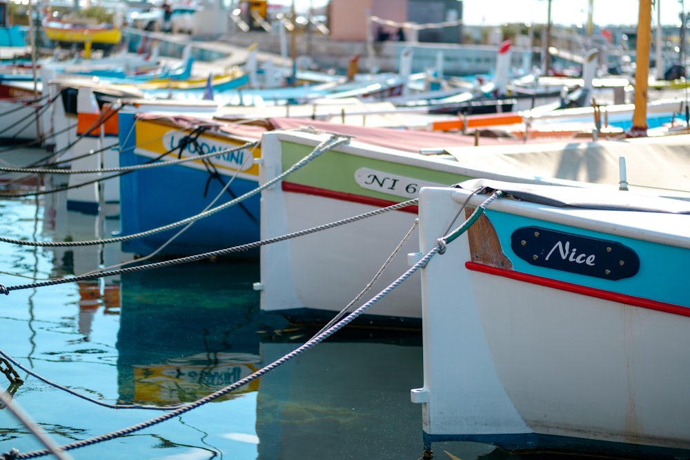 boats on dock during daytime