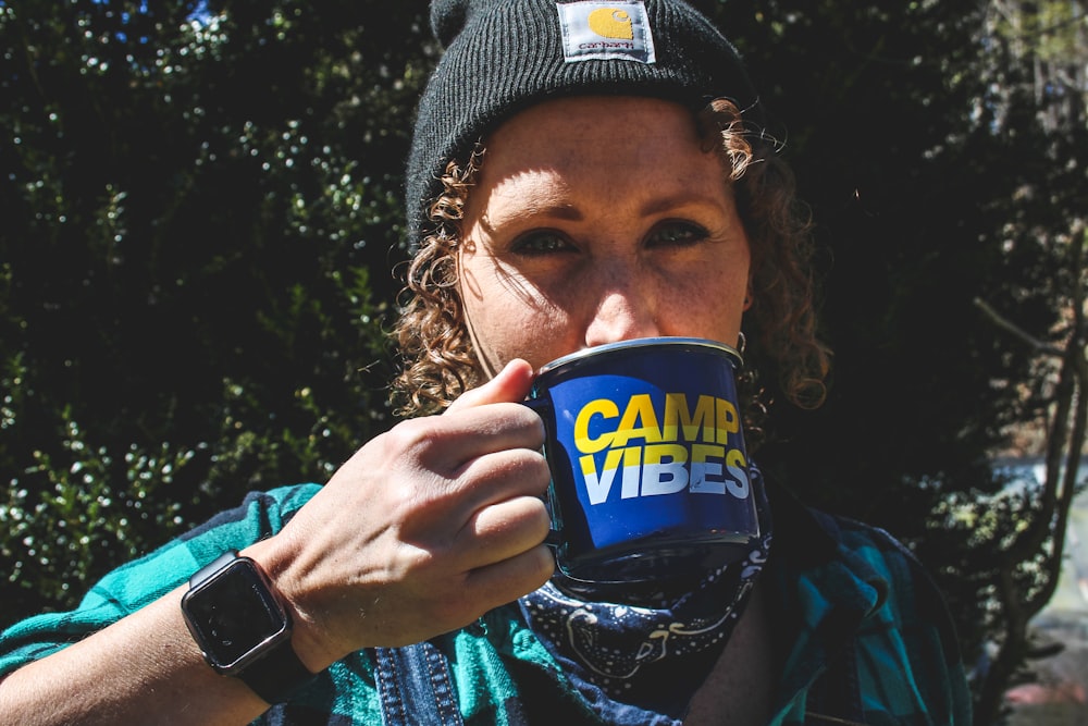 woman sipping coffee mug