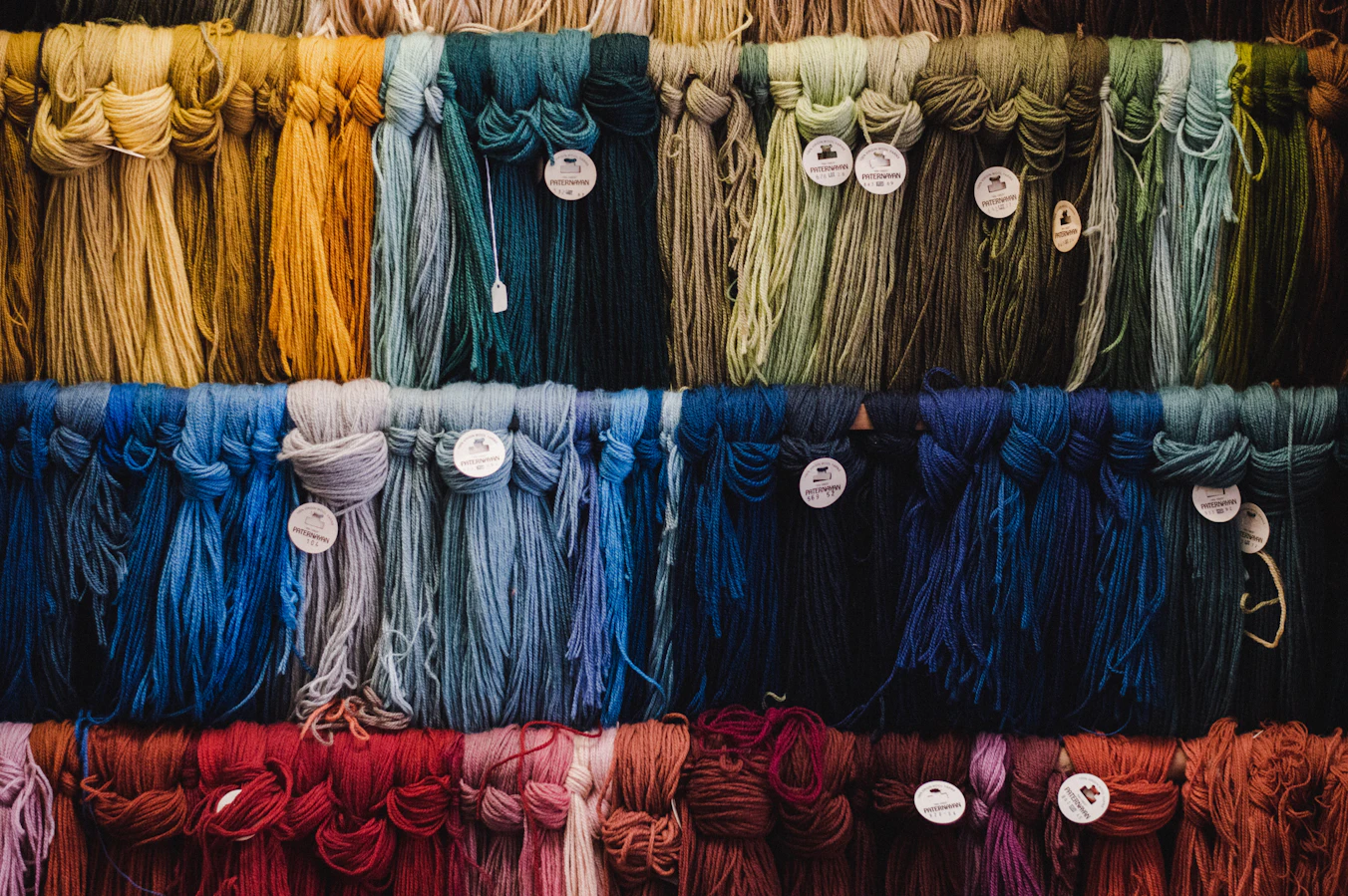 Aesthetic photo of yarn for sale in a market