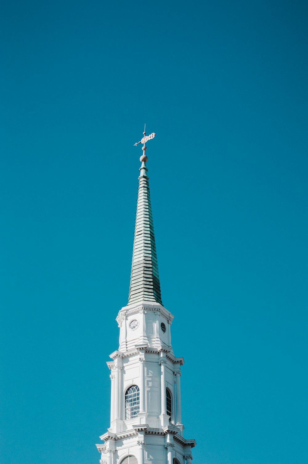 pointed-roof top building