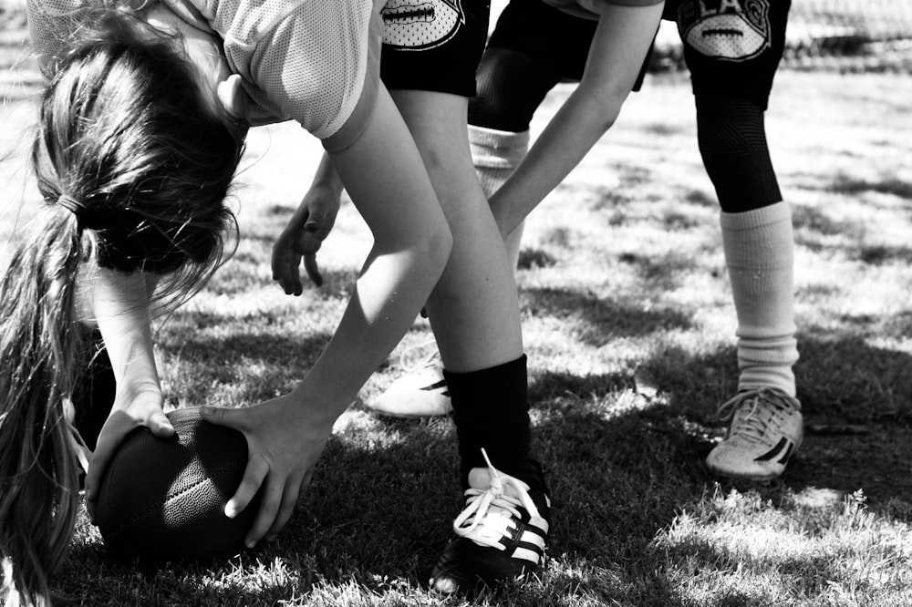 two person playing American football