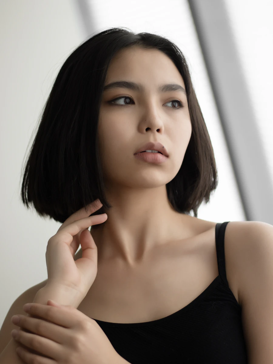 Woman with a polished chin-length bob haircut