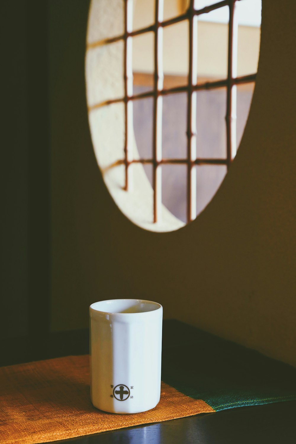 white mug on table