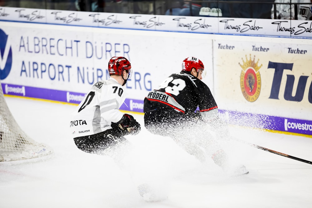 two hockey players in hockey stadium