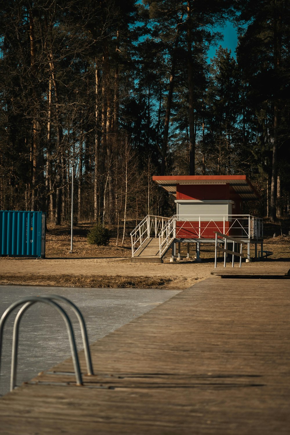 white and red wooden stall