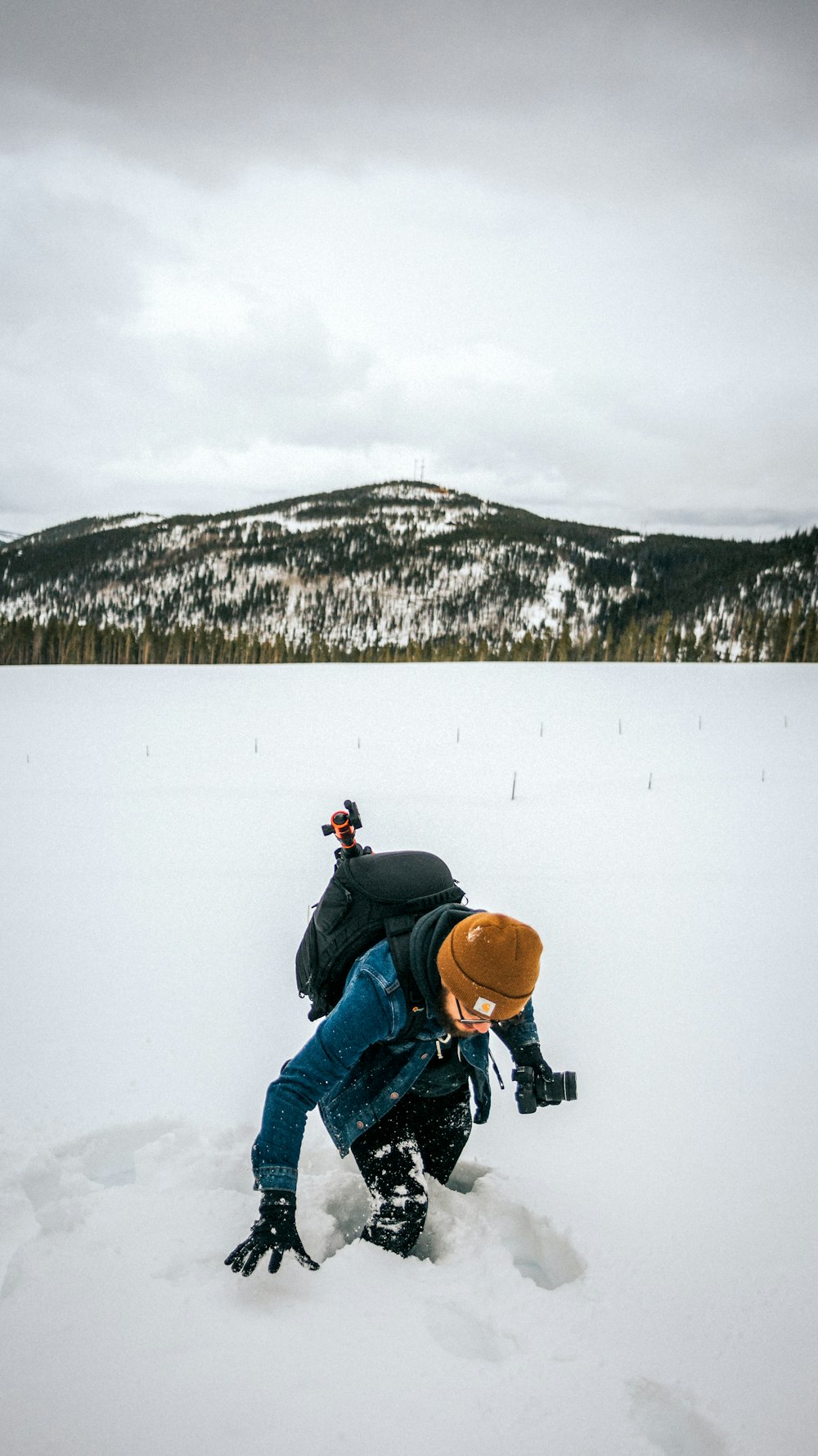 person walking in thick snow