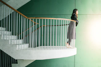 woman standing on stair