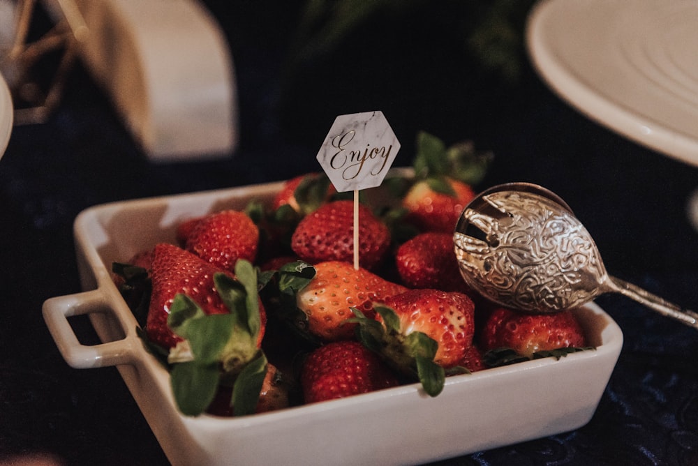 strawberries in white plate