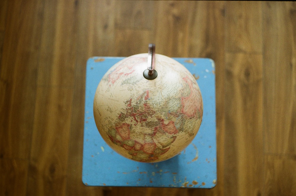 desk globe in wooden board