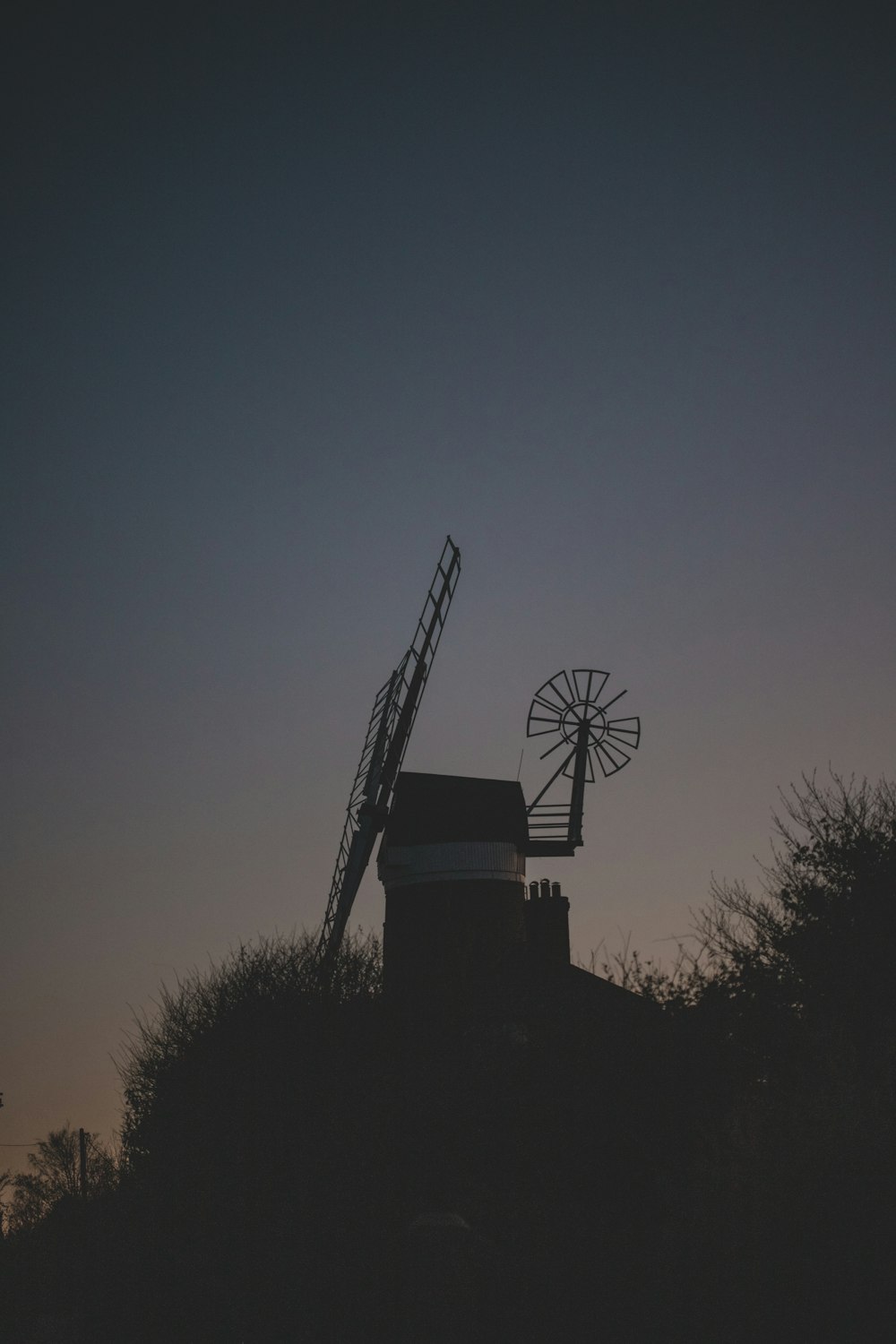silhouette photography of windmill