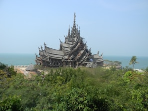 Beautiful wooden temple with intricate carvings and polished finish.