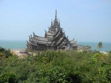 Beautiful wooden temple with intricate carvings and polished finish.