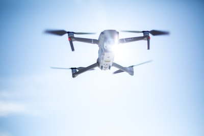 flying white drone