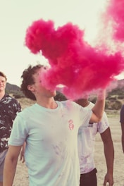 A group of diverse individuals celebrating their smoke-free lifestyles outdoors.