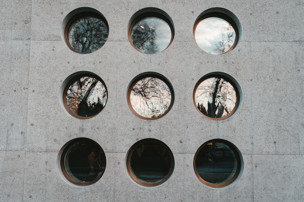 nine round windows on wall