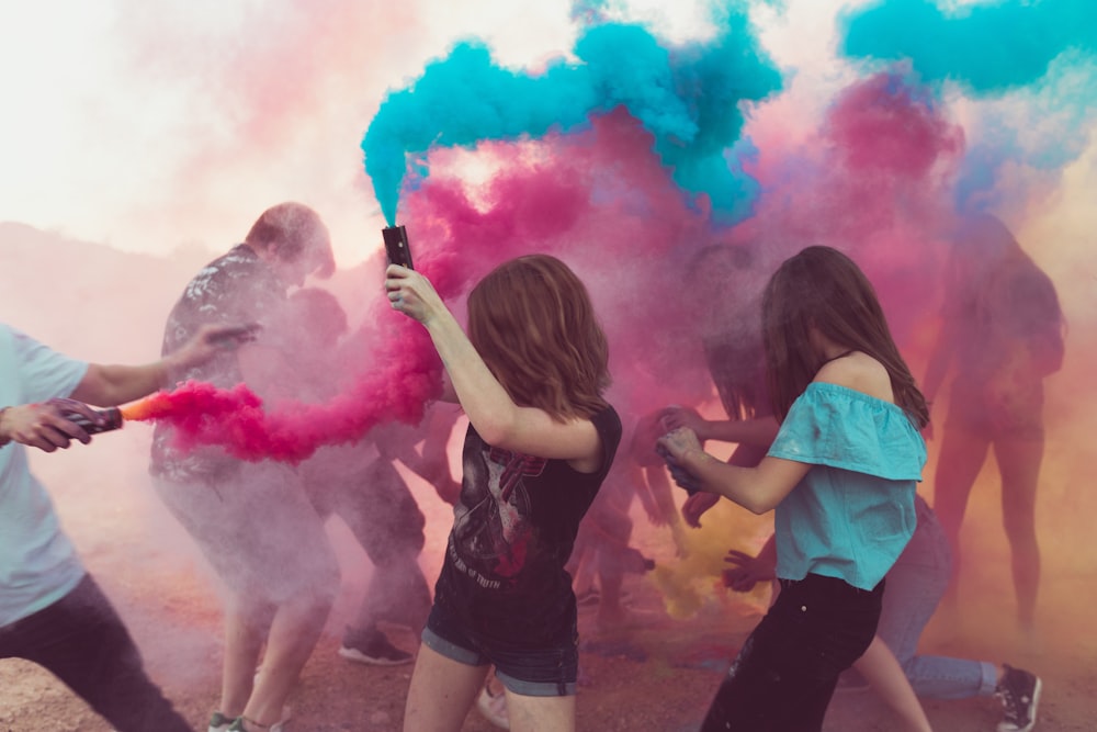 people spraying powder