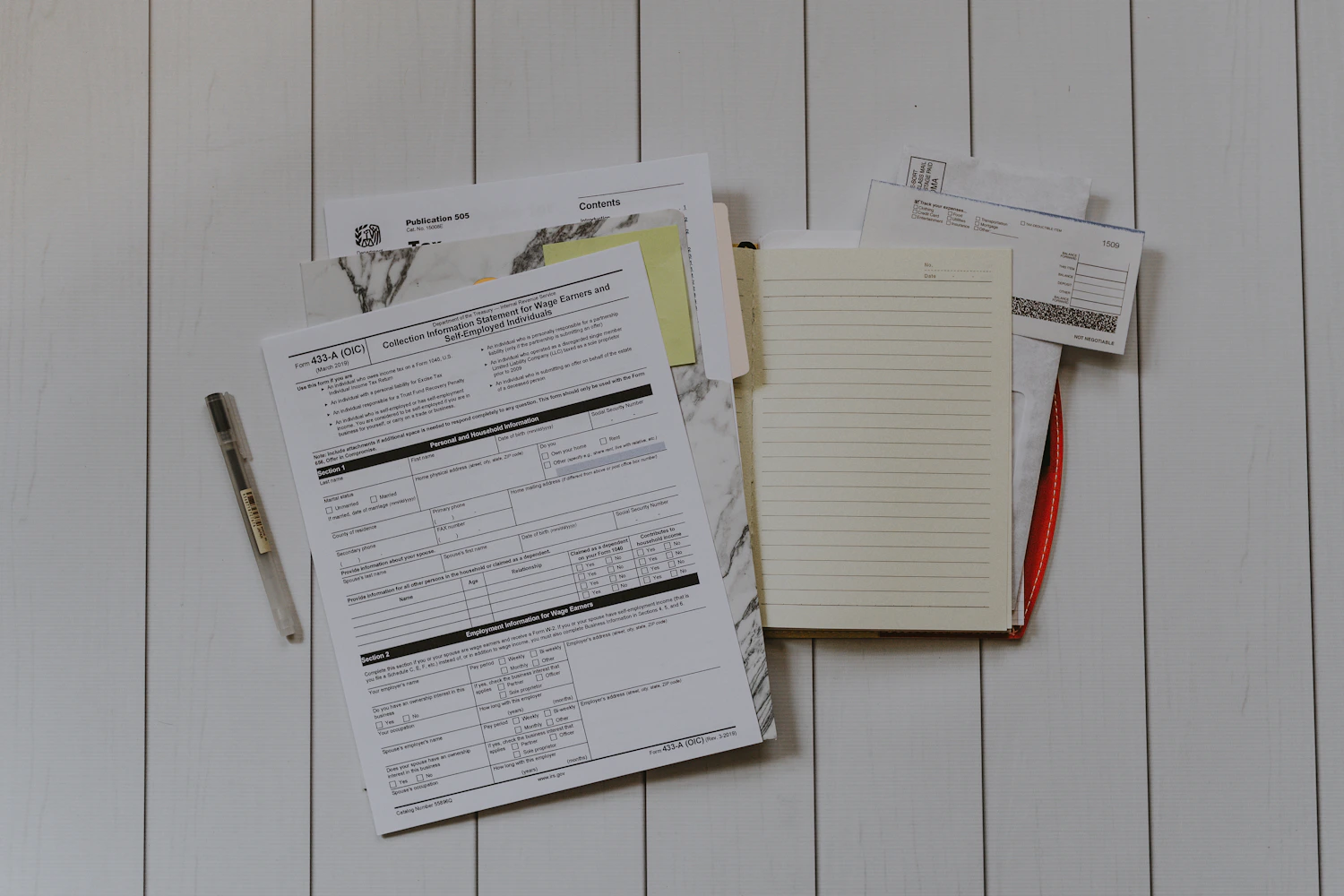 Calculator and financial documents on a desk