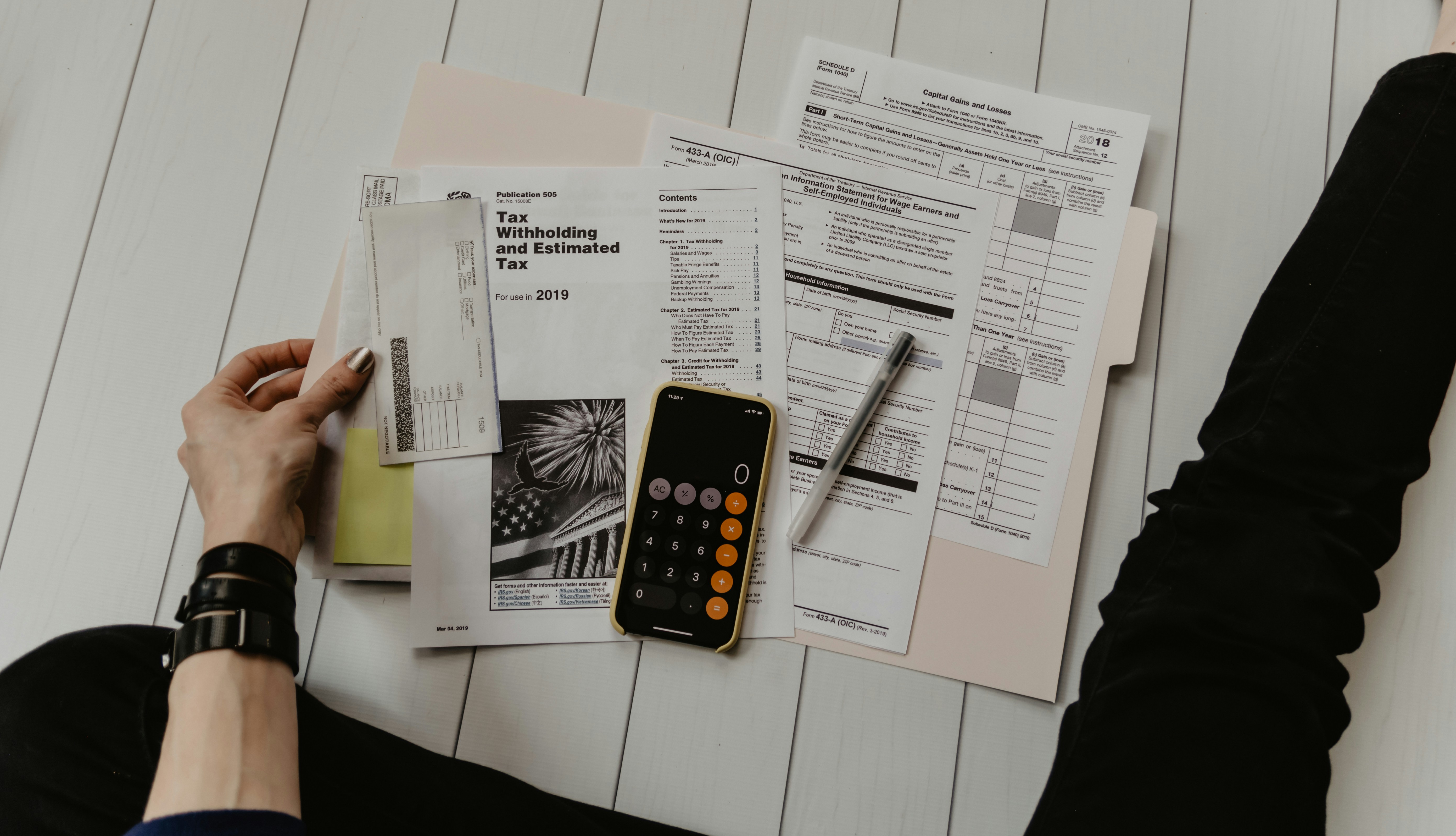 Person reviewing financial documents and loan terms