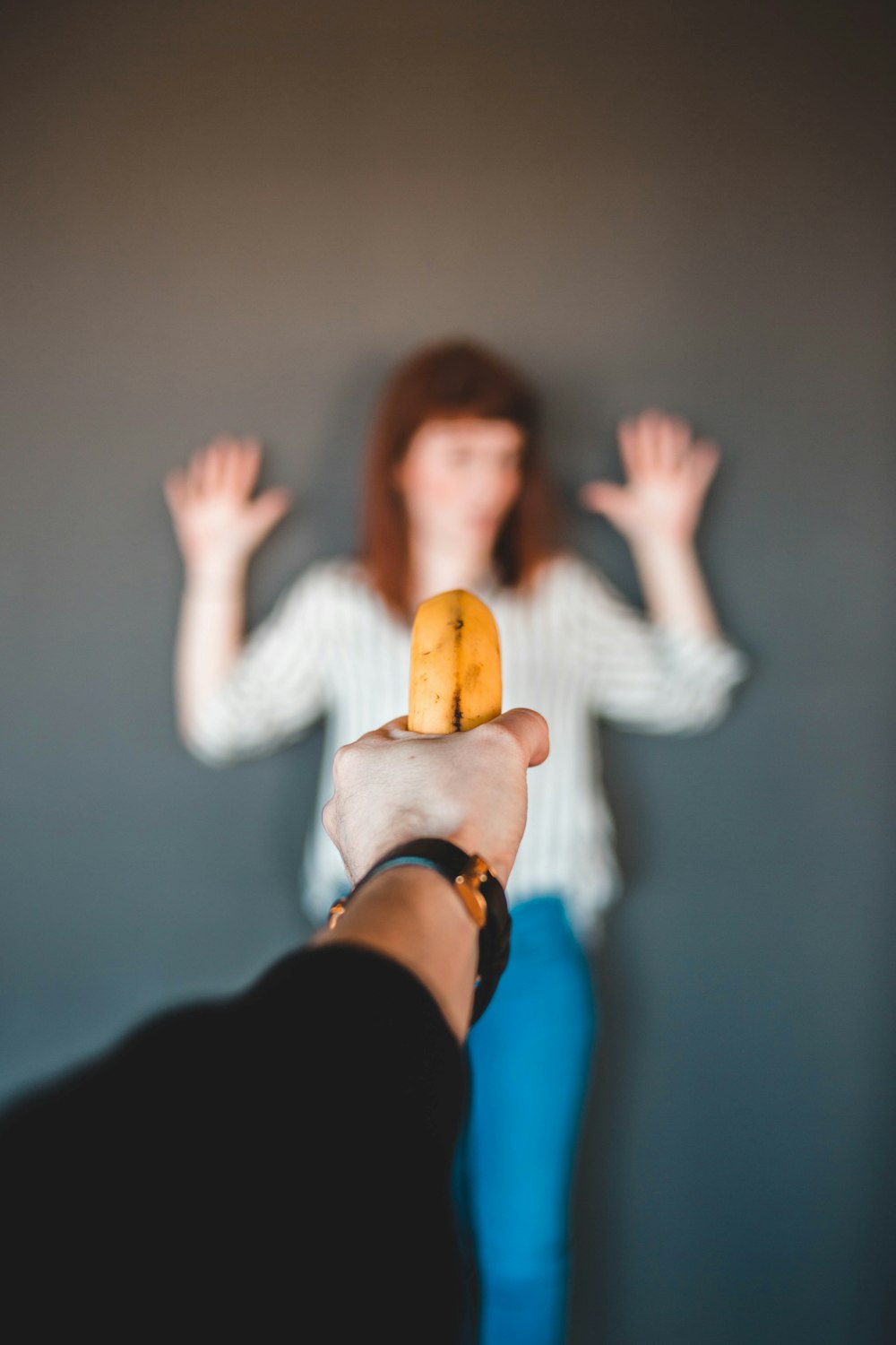 person holding banana