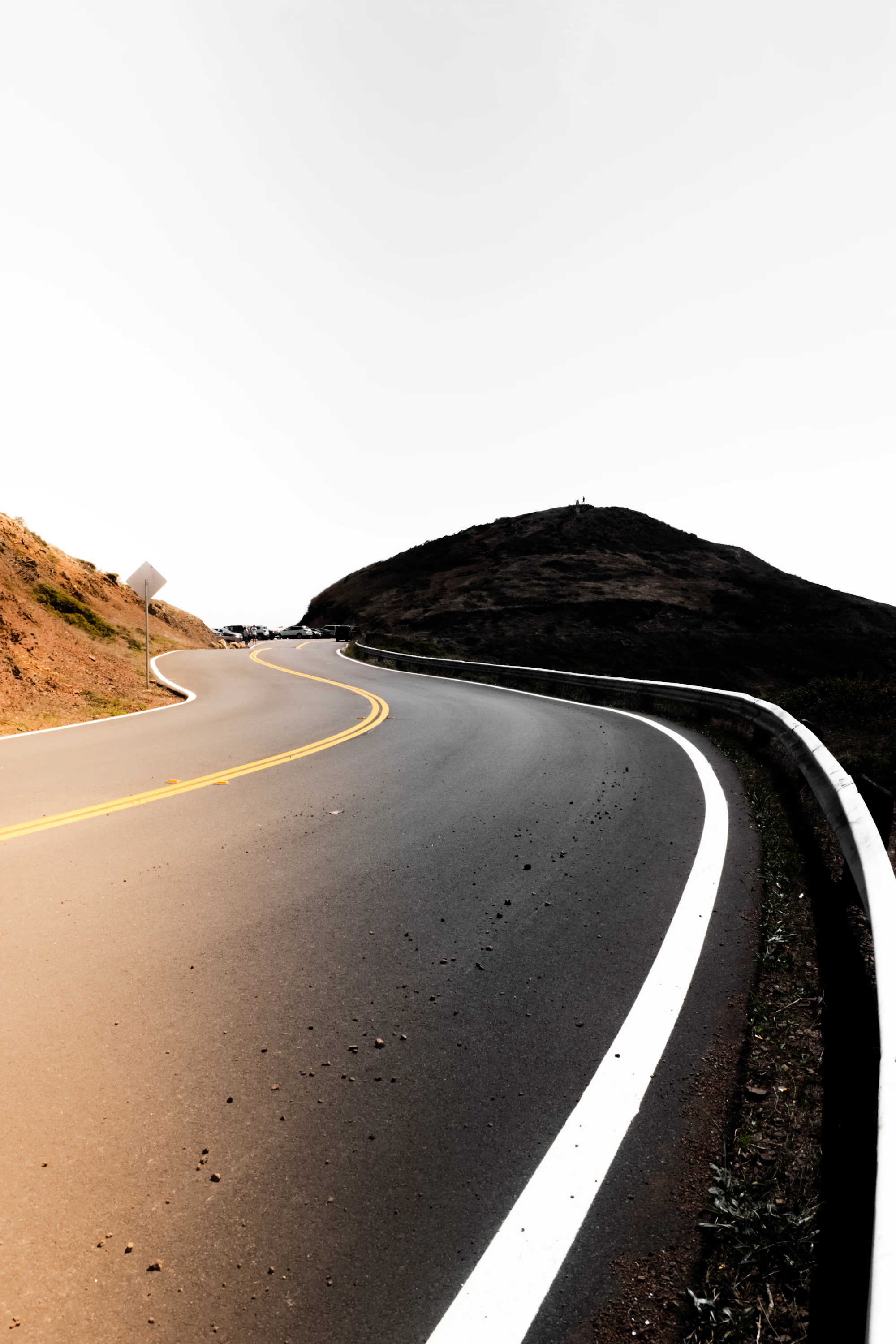 A road of tight hairpin turns cut into a mountainside