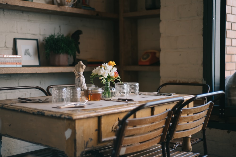 brown wooden table with chairs