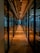 glass paneled long wooden floored hallway