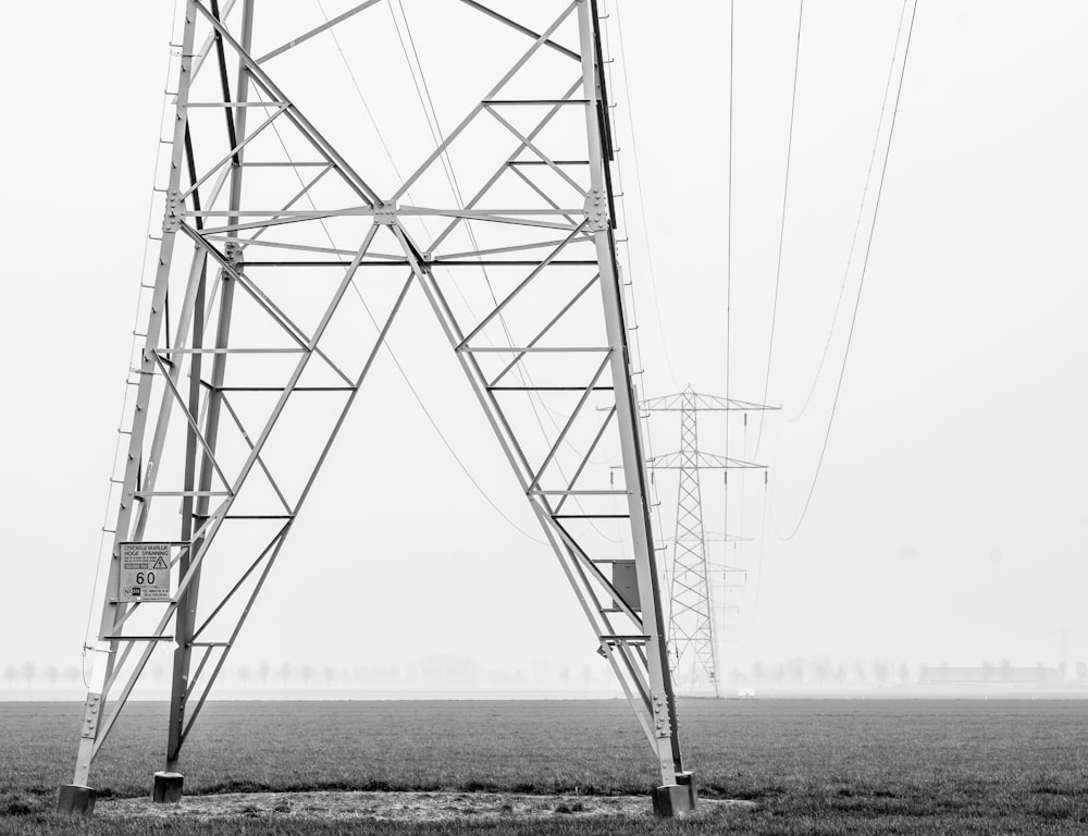 grayscale photography of transformer tower