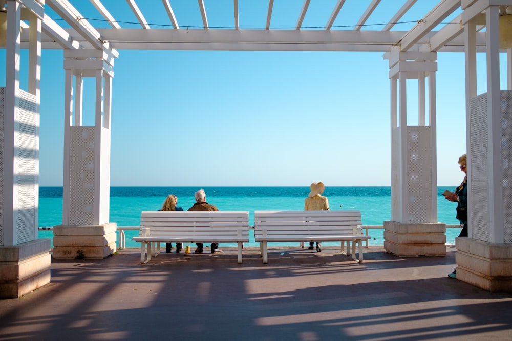 people sitting on bench