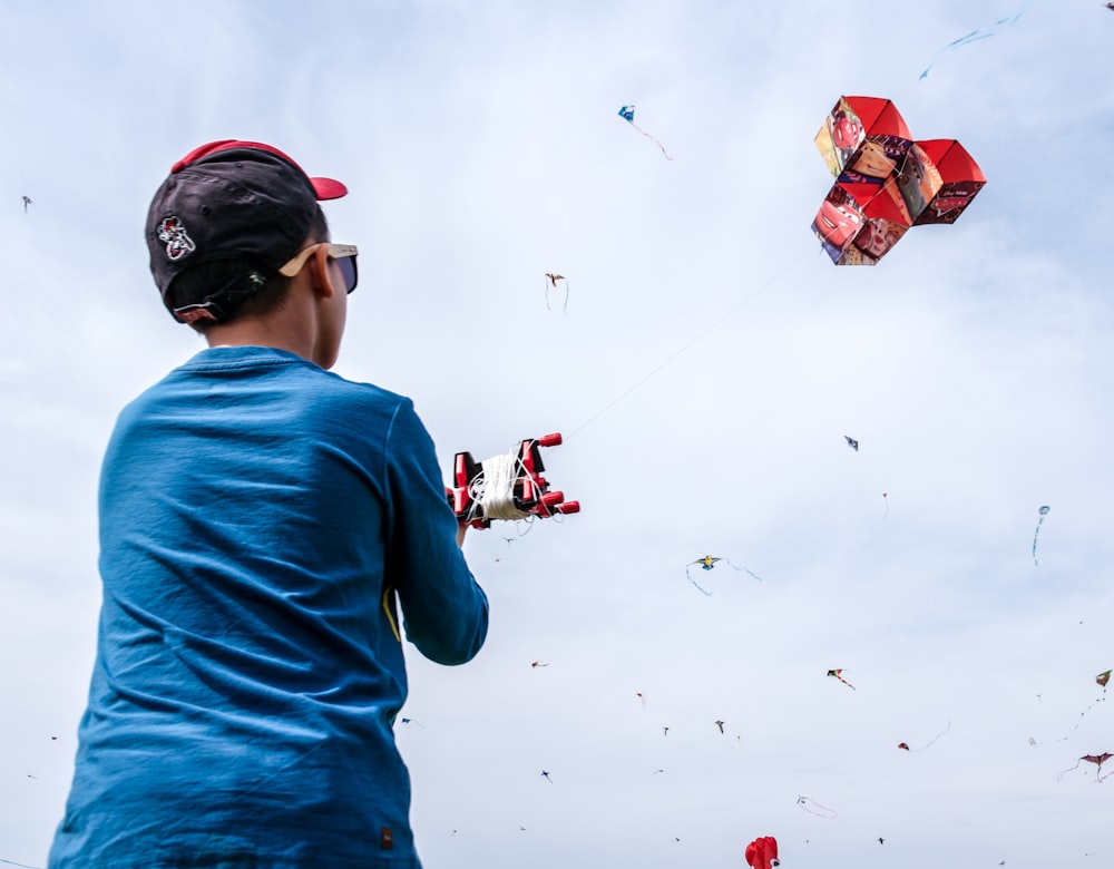 boy playing kite