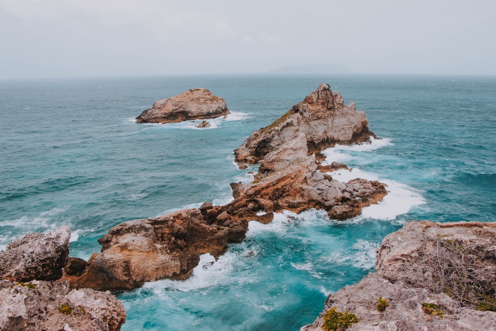 brown rocks at the ocean