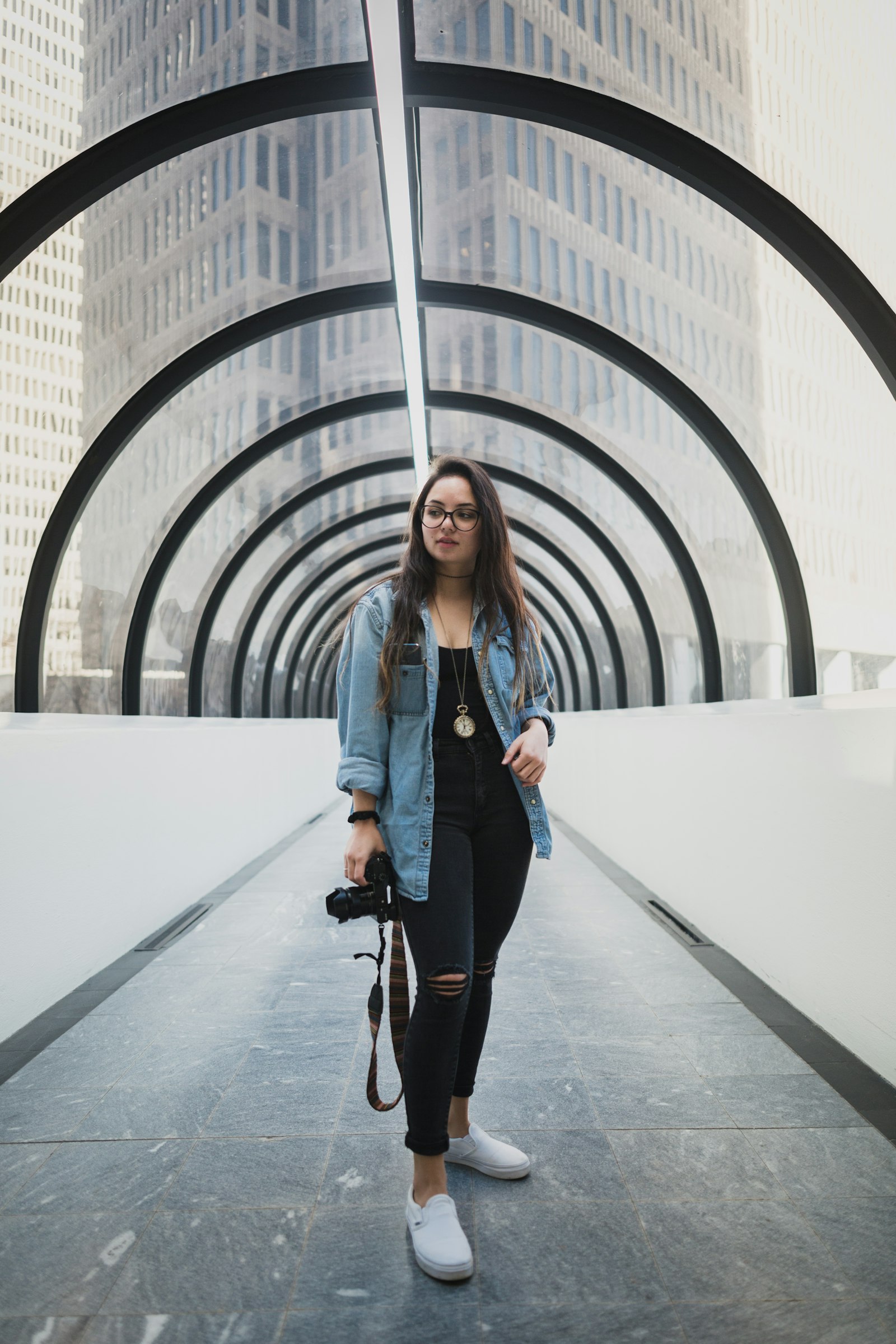 Sigma 24-35mm F2 DG HSM Art sample photo. Woman in glass structure photography